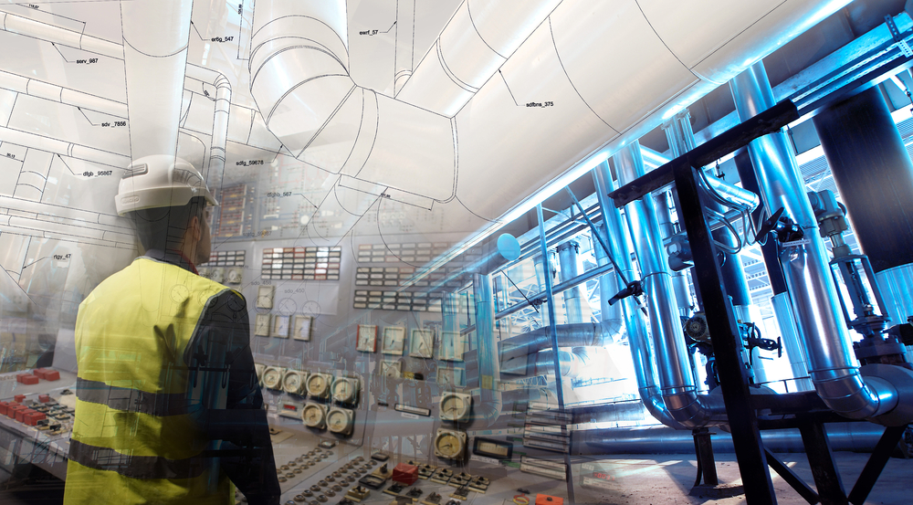 Composite image of engineer in hard hat